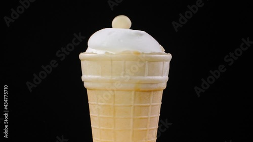 Ice cream sundae in a waffle cup. Slow motion 180 fps