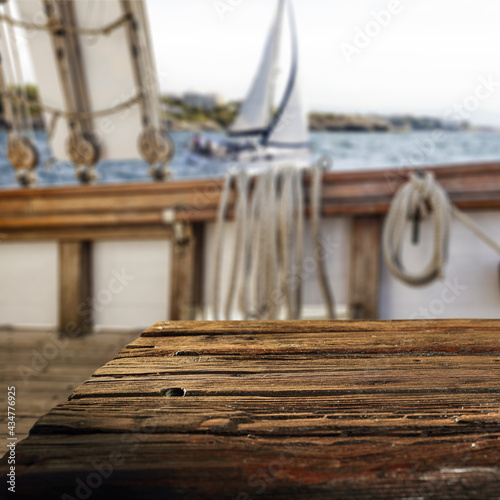 Fototapeta Naklejka Na Ścianę i Meble -  Wooden desk of free space and summer time on ship 