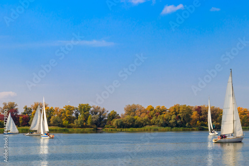 Yachts at sailing regatta on the Dnieper river in Kremenchug, Ukraine