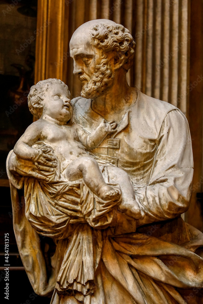 Saint Philippe du Roule church, Paris, France.  Saint Joseph holding baby Jesus