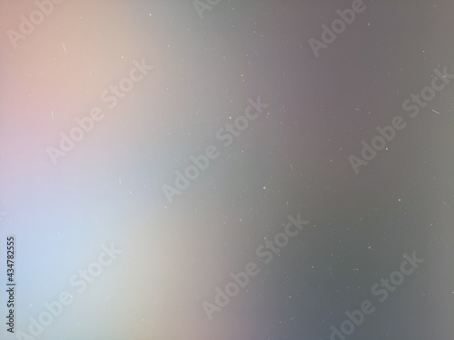 soft, blurry iridescent highlights creating a gradient