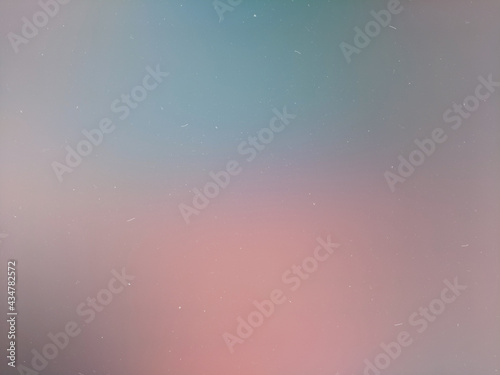 soft, blurry iridescent highlights creating a gradient