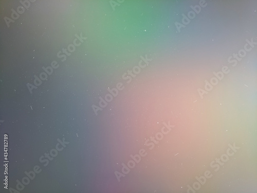 soft, blurry iridescent highlights creating a gradient