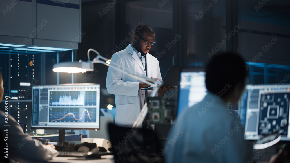 Modern Electronics Development Facility: Diverse Team of Multi-Ethnic Engineers, Scientists Work on Computers, Design Robotics PCB, New Generation Silicon Microchips, Manufacturing Semiconductors Modern Electronics Development Facility: Diverse Team of Multi-Ethnic Engineers, Scientists Work on Computers, Design Robotics PCB, New Generation Silicon Microchips, Manufacturing Semiconductors