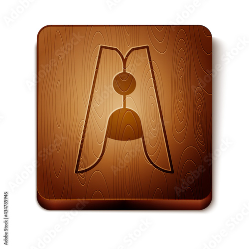 Brown Old wood clothes pin icon isolated on white background. Clothes peg. Wooden square button. Vector
