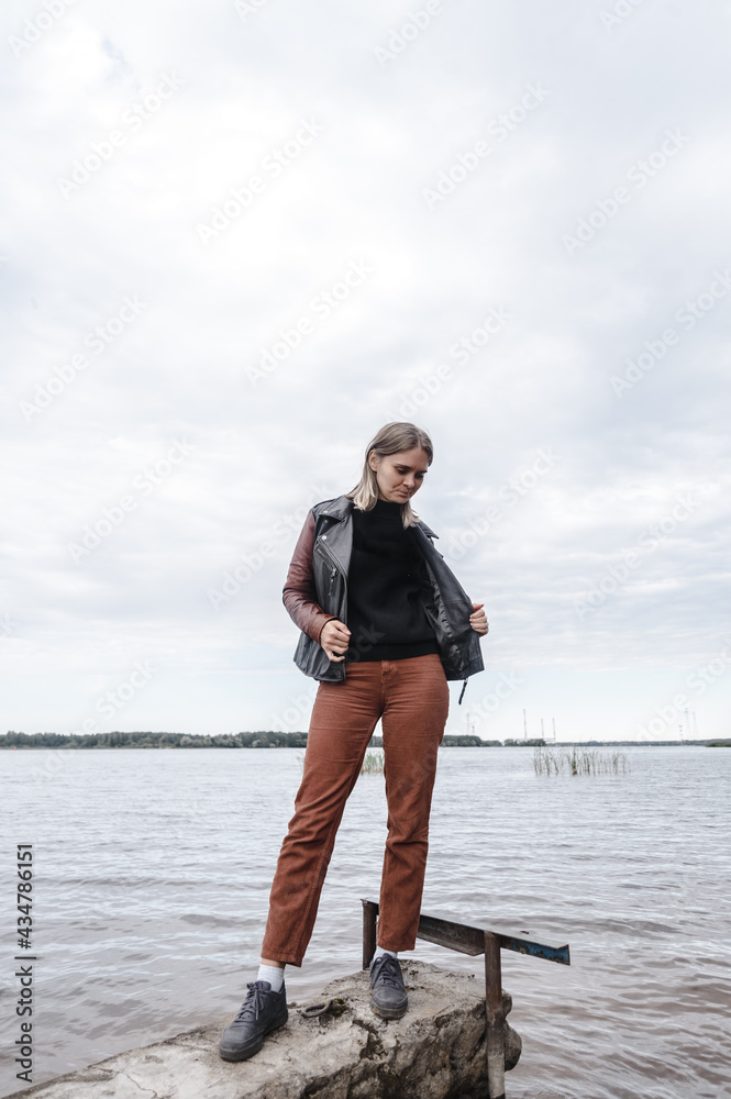 young woman near the water river horizon autumn water body of water leather j