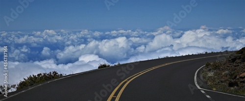 road in mountains above the clouds