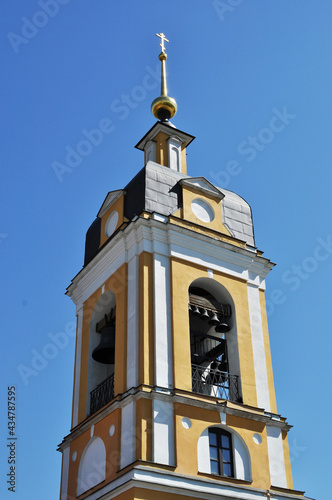 View of the high church bell tower. Bells of different sizes on the bell tower.
