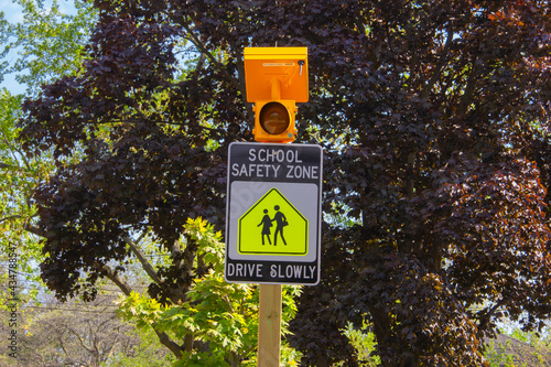 Blinking school safety zone sign