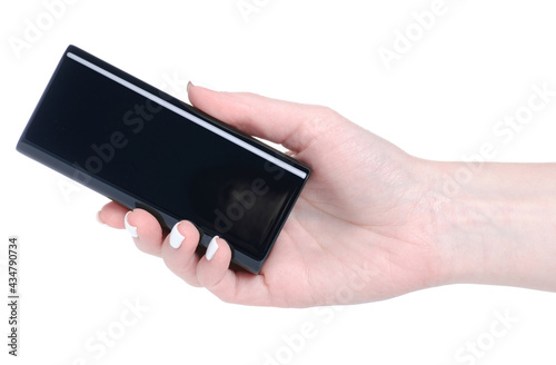 Black power bank in hand on white background isolation