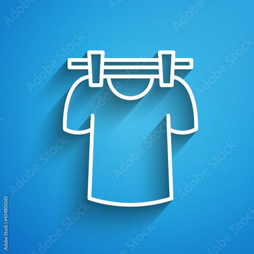 White line Drying clothes icon isolated on blue background. Clean shirt. Wash clothes on a rope with clothespins. Clothing care and tidiness. Long shadow. Vector