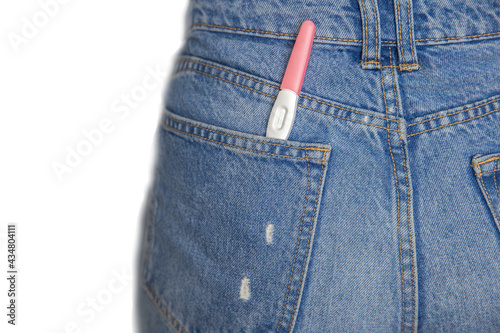 Young woman and pregnancy test with blank copy space for positive or negative result composite isolated on white background, Pregnancy test in jeans pocket