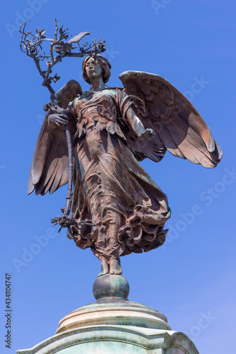 Bronze winged figure of Peace holding an uprooted olive tree on top of the South African War Memorial in Cathays Park  Cardiff  Wales  UK
