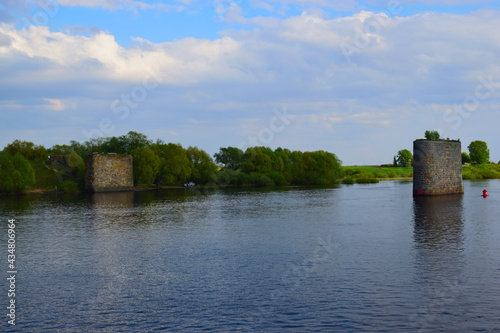The pillars of the ancient unfinished bridge view from the river Volkhov