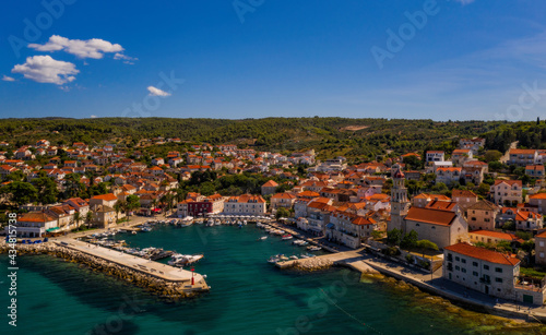 Town of Sutivan skyline view, Island of Brac, Croatia. Aerial drone view in august 2020 © Сергій Вовк