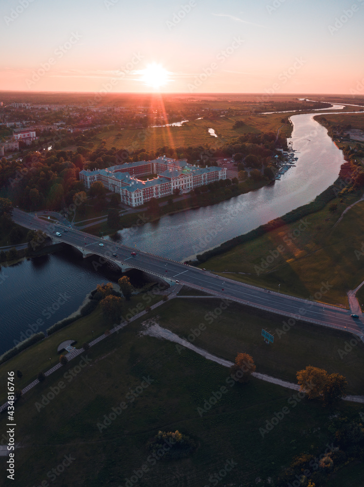 Jelgava, Latvia, state University, aerial drone summer sunset. Winding river. Historical city landmark