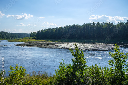 wide river landscape scene with large body of water