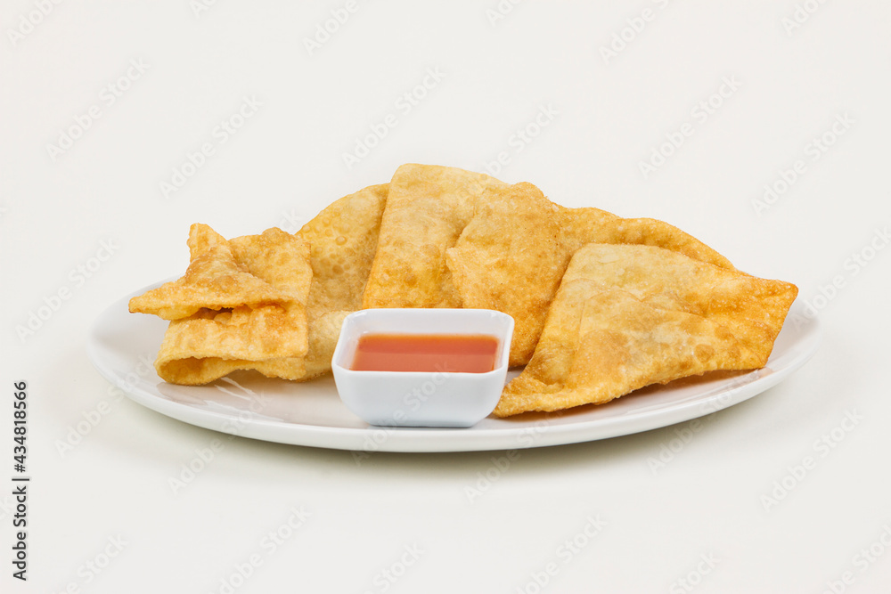 Fried wonton with sauce. Fried wonton with sauce.