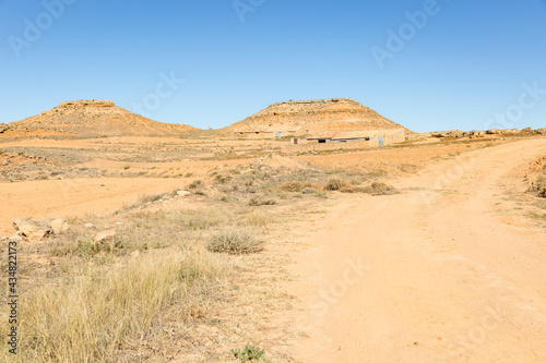 a dry summer landscape with a refuge for sheep next to Monreal de Ariza, province of Zaragoza, Aragon, Spain