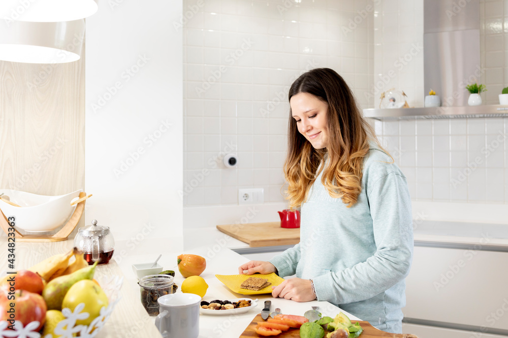 Young girl preparing a healthy breakfast.