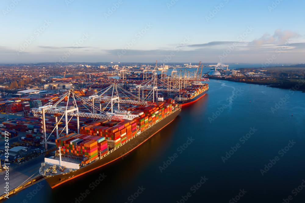 Aerial view of colorful containers on cargo ships at port of Southampton, one of UK Leading Port Terminal Operators and this container terminal is Britain's second largest deep sea termal. - obrazy, fototapety, plakaty 