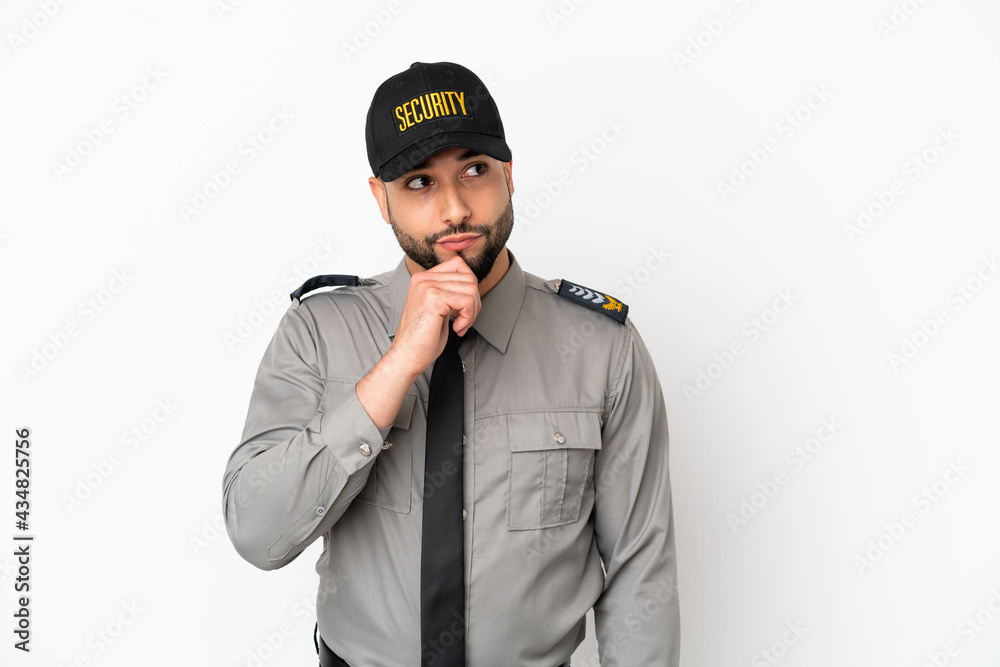 Young arab man isolated on white background and looking up Young arab man isolated on white background and looking up
