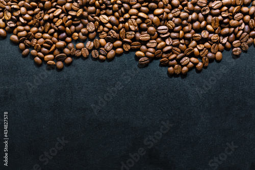 Coffee beans on dark background © nerudol