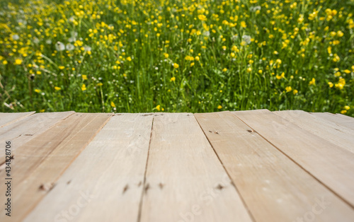 Beautiful warm day with Table..Background with red leaves wooden planks.