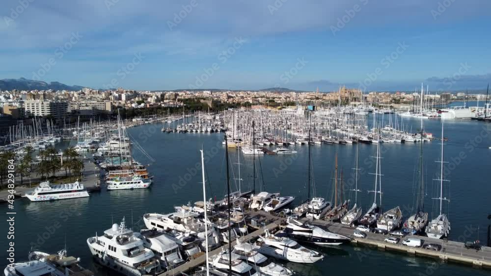 Aerial over Palma de Mallorca-marina, cityscape and luxury yachts Aerial over Palma de Mallorca-marina, cityscape and luxury yachts