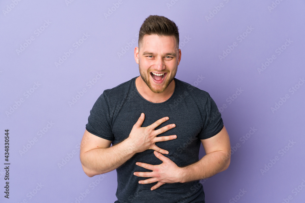 Russian handsome man over isolated background smiling a lot Russian handsome man over isolated background smiling a lot