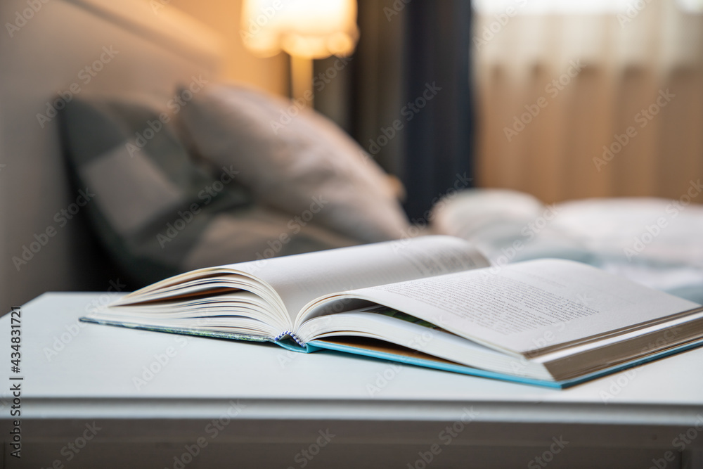 cozy bedroom detail focus on open book cozy bedroom detail focus on open book