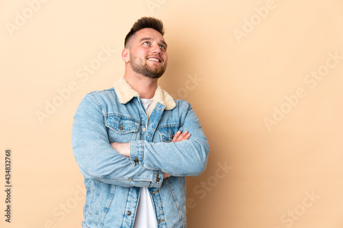 Russian handsome man over isolated background happy and smiling