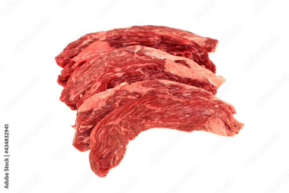 Fototapeta premium Raw Tenderloin Beef Steak or Skirt Steak Isolated On White Background, Overhead View. Set Of Beef Steaks for Grilling or Frying. Uncooked Machete Steak or Bavet Steak On White Background.