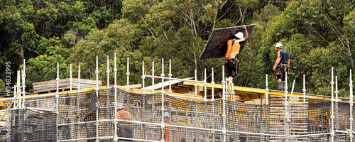 Installing flooring concrete formwork. Construction progress on new building site at 56-58 Beane St. Gosford, Australia. April 9, 2021.Part of a series.