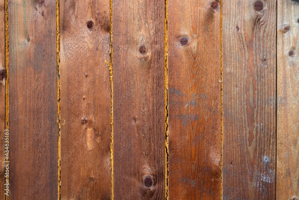 background of brown old boards with mounting foam.