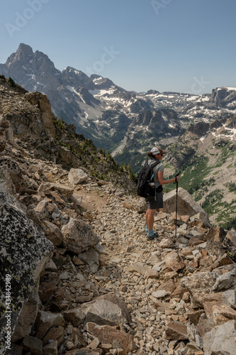 Hiker Looks Out From Paintbrush Divide