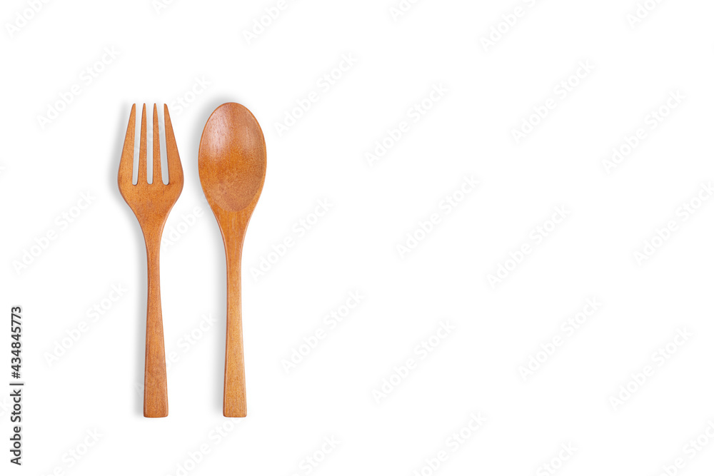 Wooden spoon and fork isolated on white background. Top view Wooden spoon and fork isolated on white background. Top view