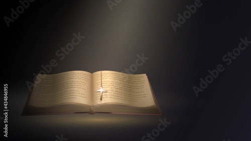 Open bible with a gold cross on a chain