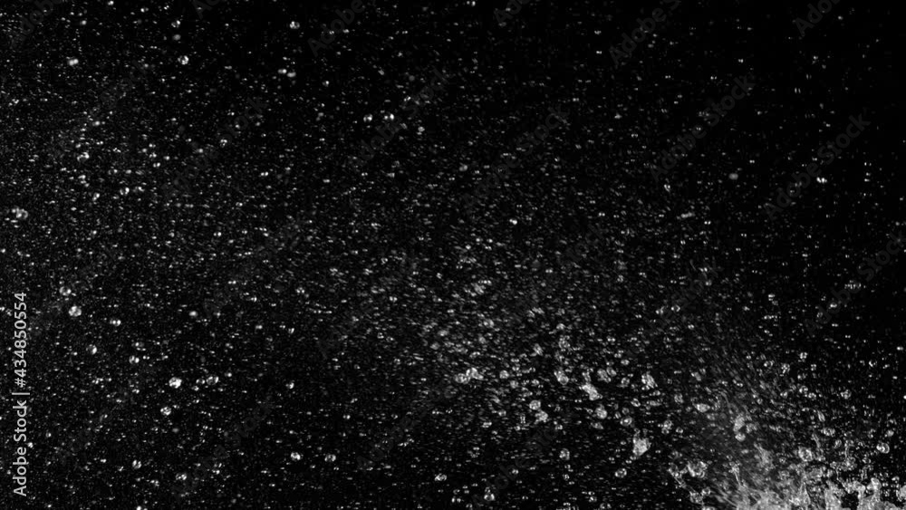 Super slow motion of splashing water isolated on black background. Filmed on high speed cinema camera, 1000 fps.