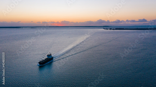 Ship sailing into Port Curtis, Gladstone, Queensland photo