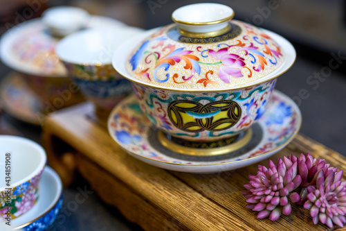 Chinese style painted teapots, cups and various tea sets