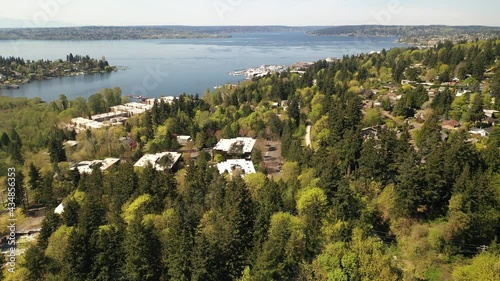 Cinematic 4K aerial drone shot of Lakeview, Central Houghton, Marina Park Pavilion, Yarrow Bay, Lake Washington commercial, residential neighborhoods near Bellevue and Seattle, King County, Washington photo