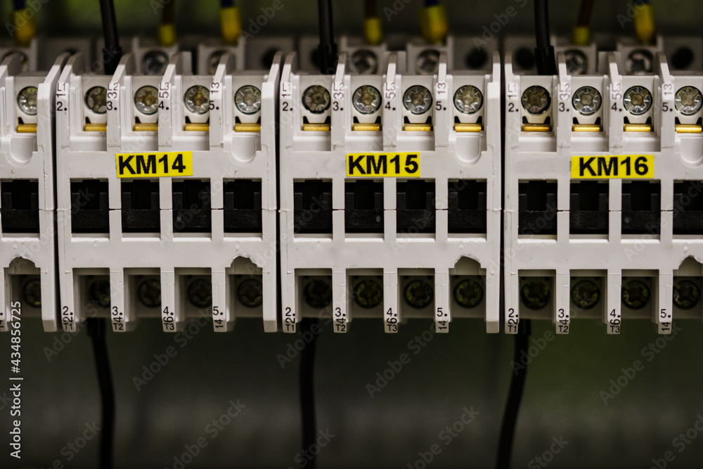 Contactors connected in the switchboard next to each other. Contactors connected in the switchboard next to each other.