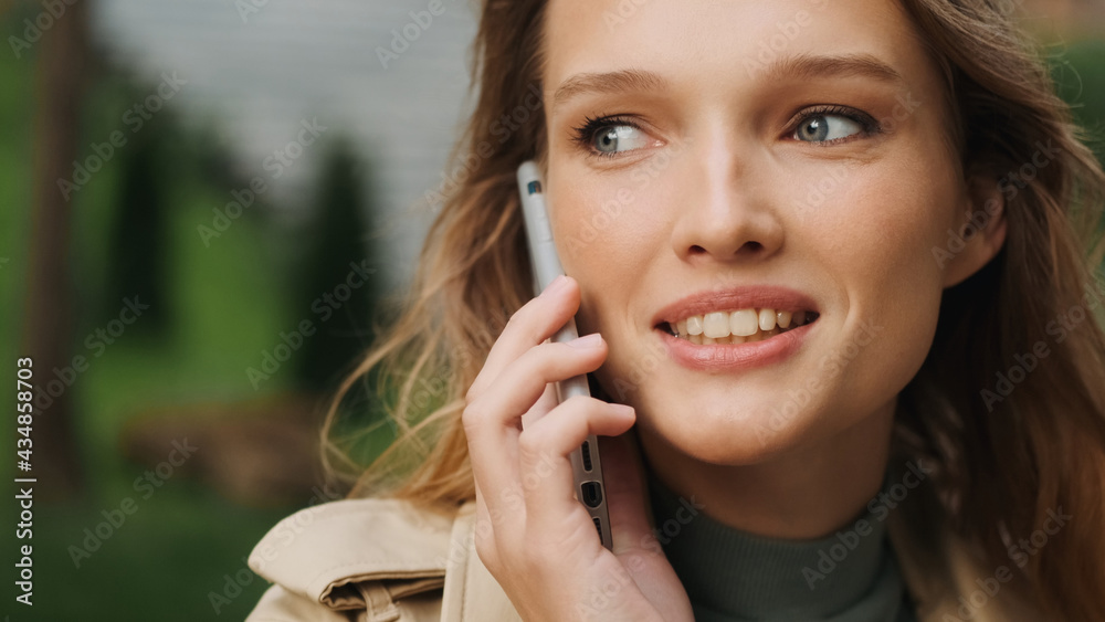 Close up beautiful student girl talking with best friend on phon Close up beautiful student girl talking with best friend on phon