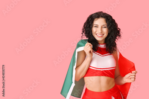 Beautiful cheerleader with ...