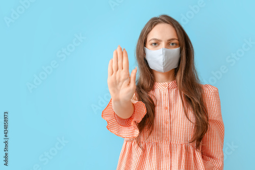 Young woman wearing medical...