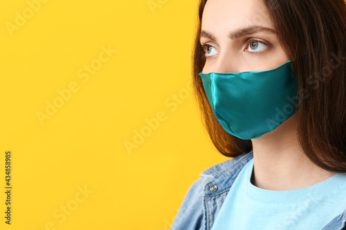 Young woman wearing medical...