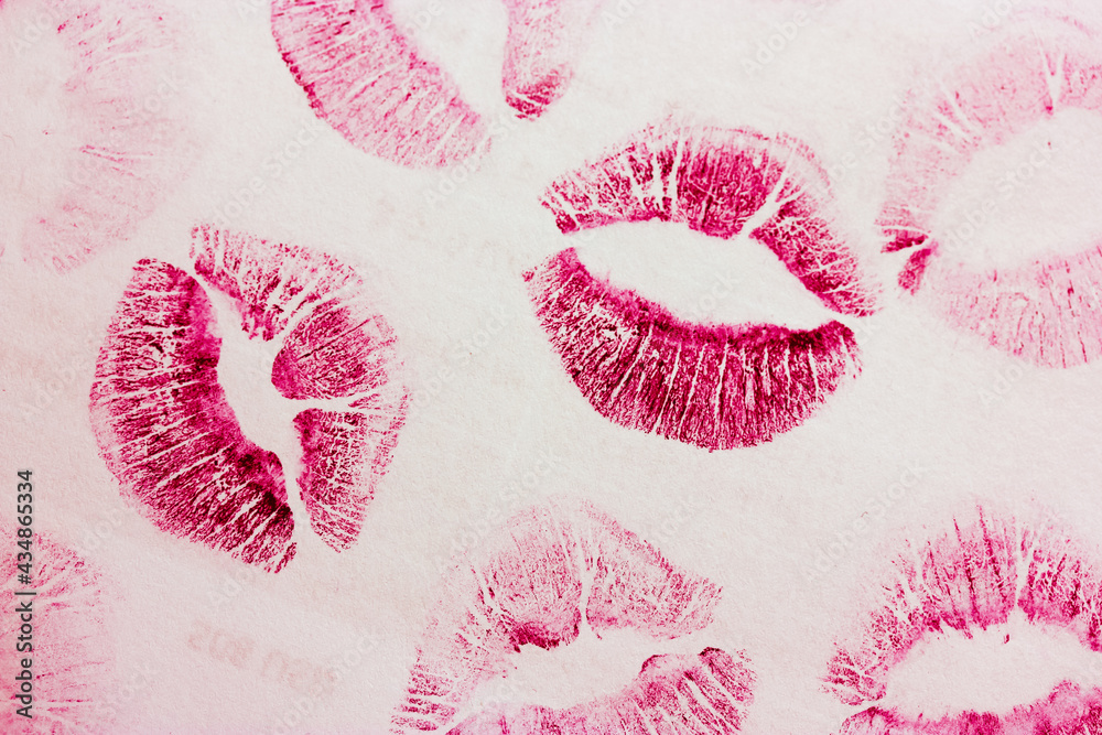 Abstract pink kisses isolated on white background. Lots of female lip  prints. Stock Photo | Adobe Stock