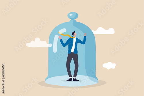 Business stagnation with no growth, obstacle or limitation in career development, punishment with no freedom in business concept, depressed businessman imprison or covered in small glass dome. photo
