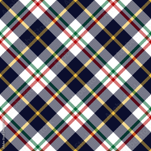 Christmas check pattern in green, red, yellow, navy blue, white. Seamless multicolored herringbone dark tartan for flannel shirt, scarf, throw, other modern holiday festive fashion fabric design.